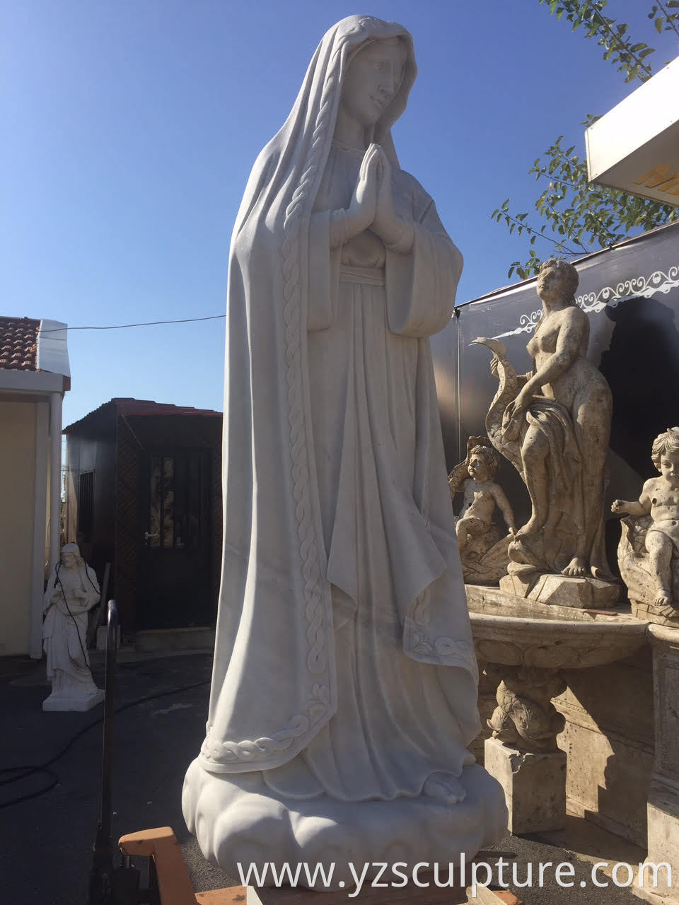 white marble virgin mary statue